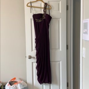 Deep purple off the shoulder long gown.